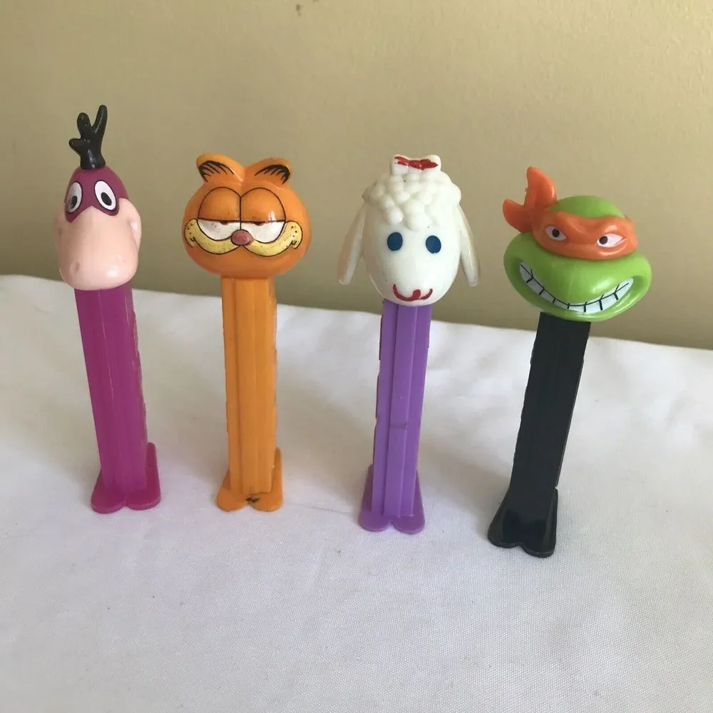 PEZ Dispensers Lot of 21 PEANUTS, DISNEY GARFIELD, SANTAS, LAMB AND‎ MORE